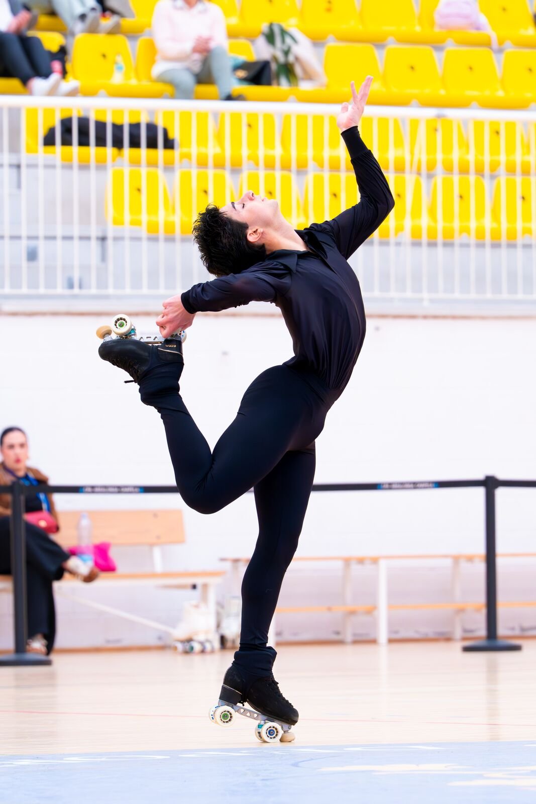 Salto durante un ejercicio de patinaje artístico